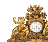 A Napoleon III Gilt Bronze Mantel Clock