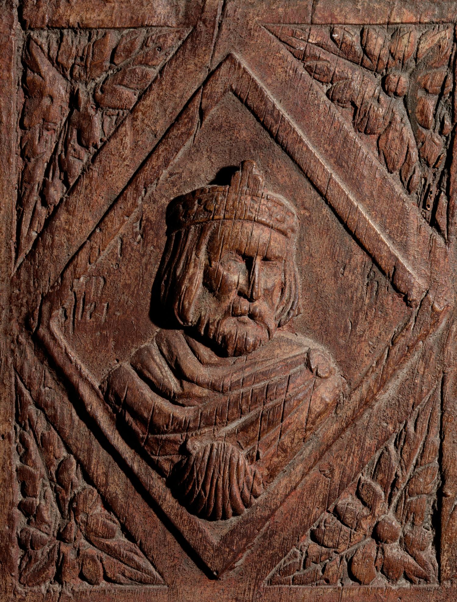 A Continental Terra Cotta Panel Cast from a Cabinet Door