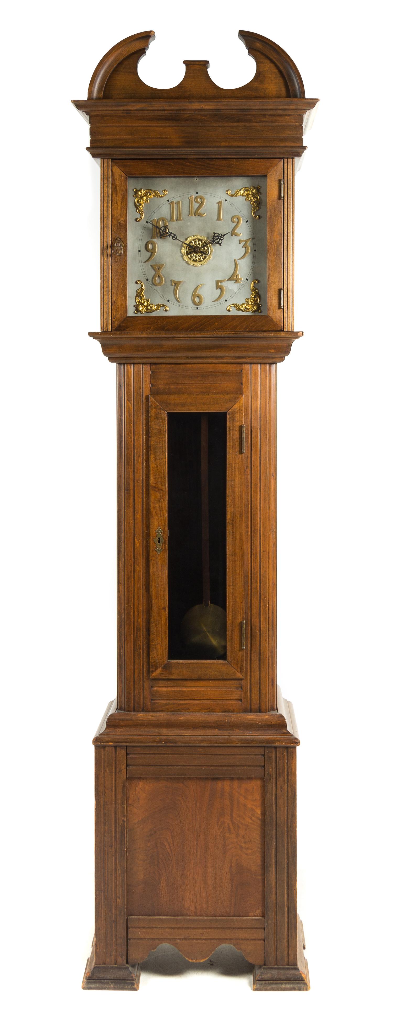 An American Walnut Tall Case Clock Height 89 inches. — WATERBURY CLOCK CO., EARLY 20TH CENTURY