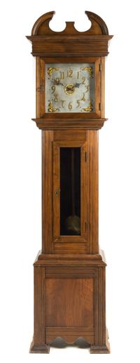 An American Walnut Tall Case Clock Height 89 inches. — WATERBURY CLOCK CO., EARLY 20TH CENTURY