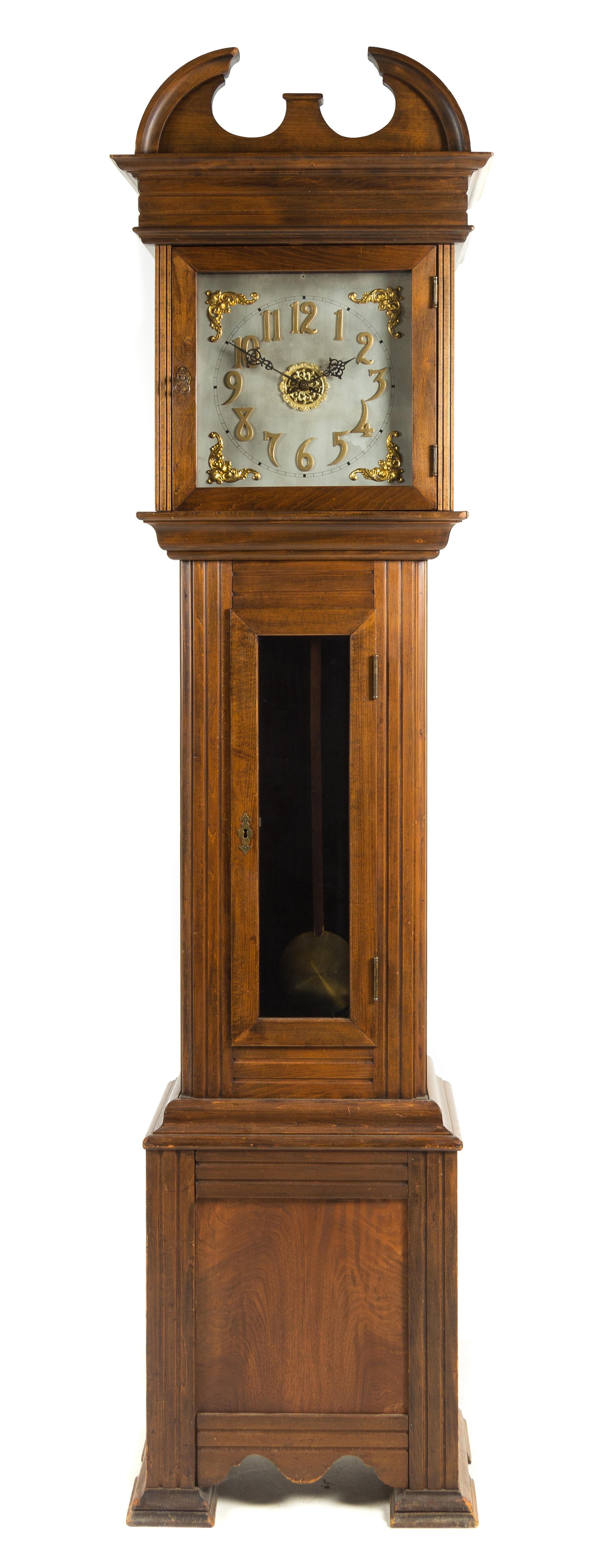 An American Walnut Tall Case Clock Height 89 inches. — WATERBURY CLOCK CO., EARLY 20TH CENTURY