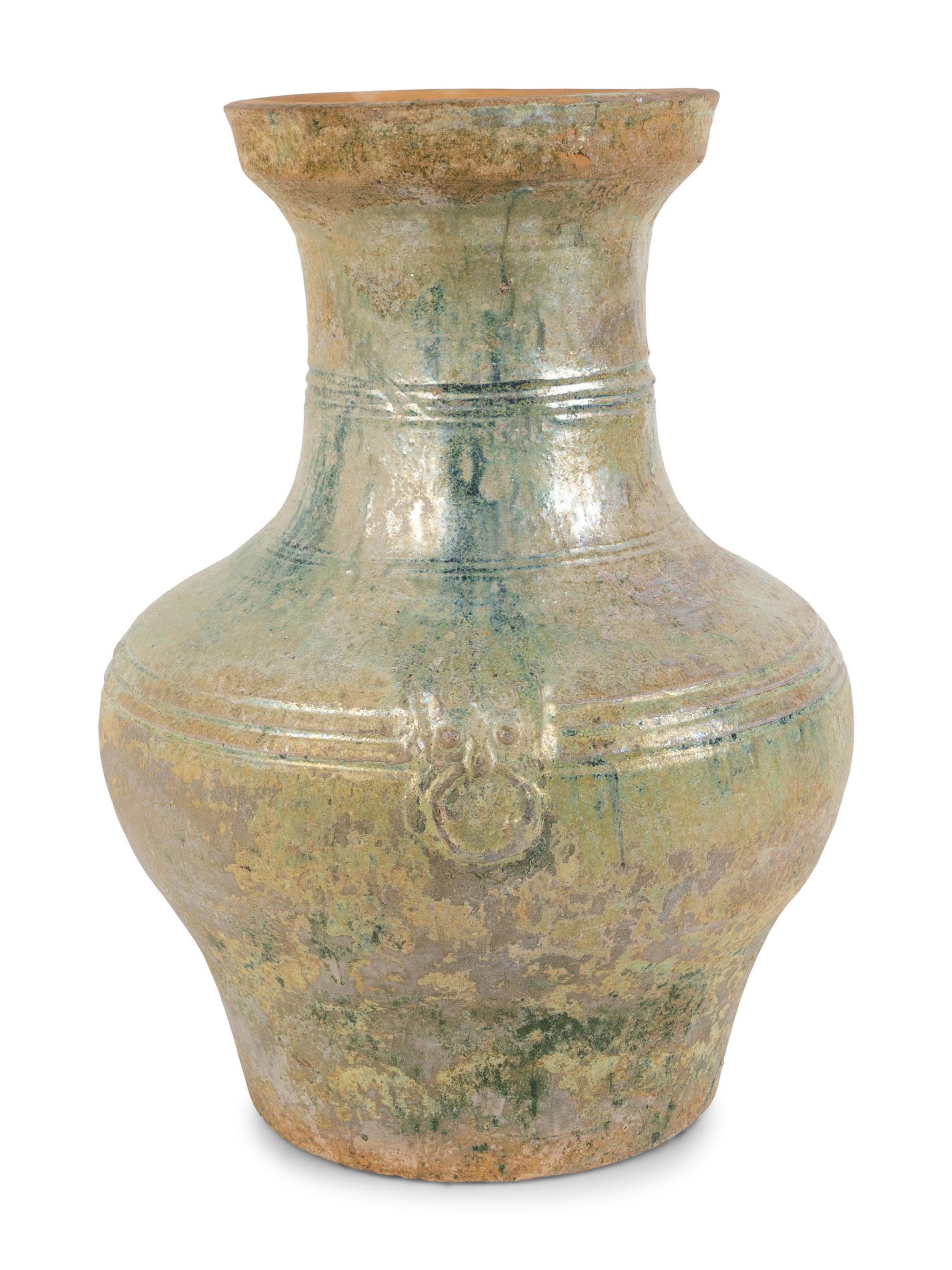 A Chinese Light Green-Glazed Terracotta Hu-Form Vase — HAN DYNASTY