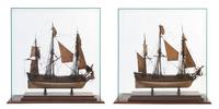 A Pair of French Presentation Ship Models, Width of case 27 inches.