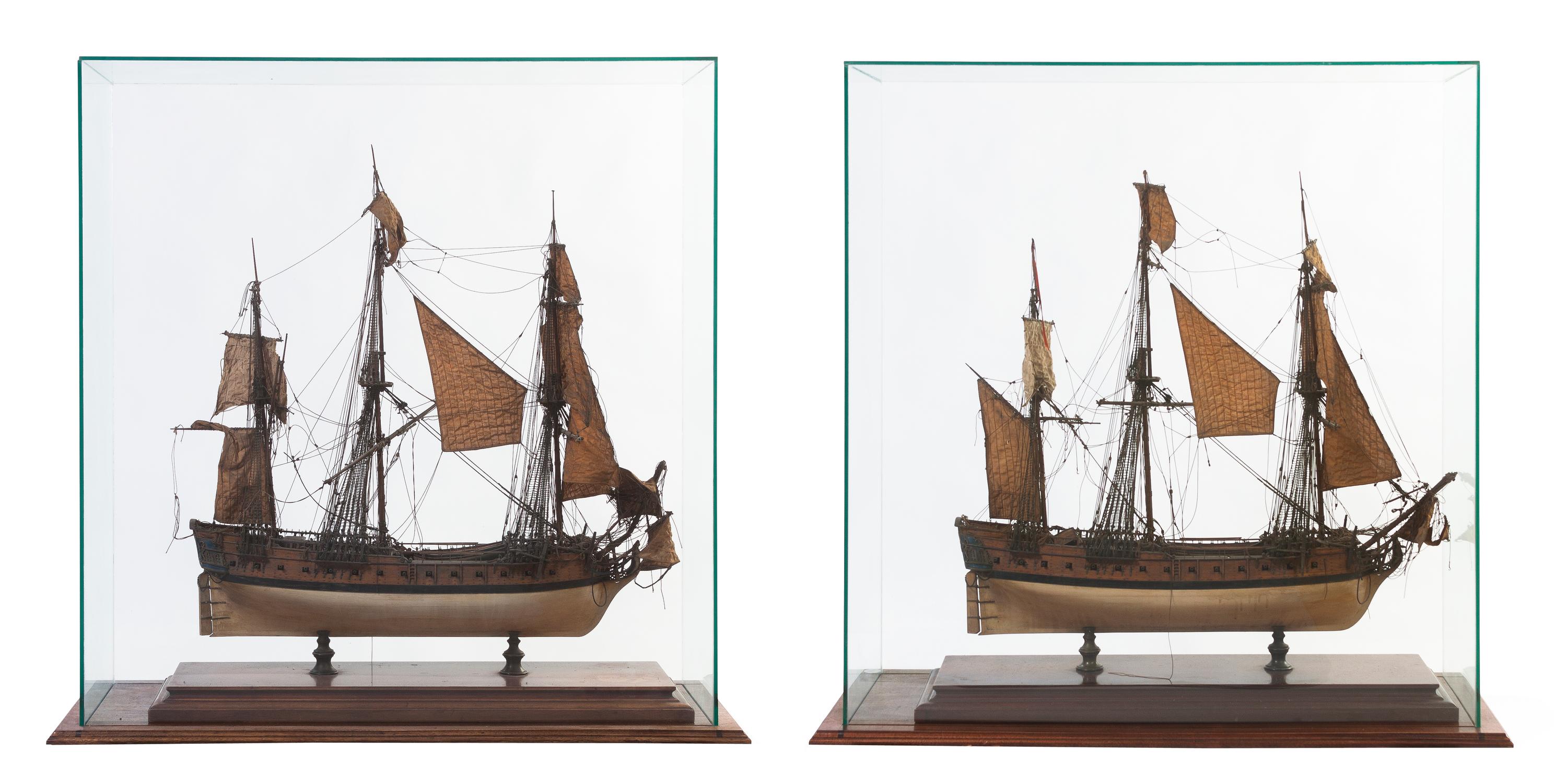 A Pair of French Presentation Ship Models, Width of case 27 inches.