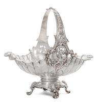 A German Silver Basket, Early 20th Cenury, of oval, handled form with scrolling foliate decoration.