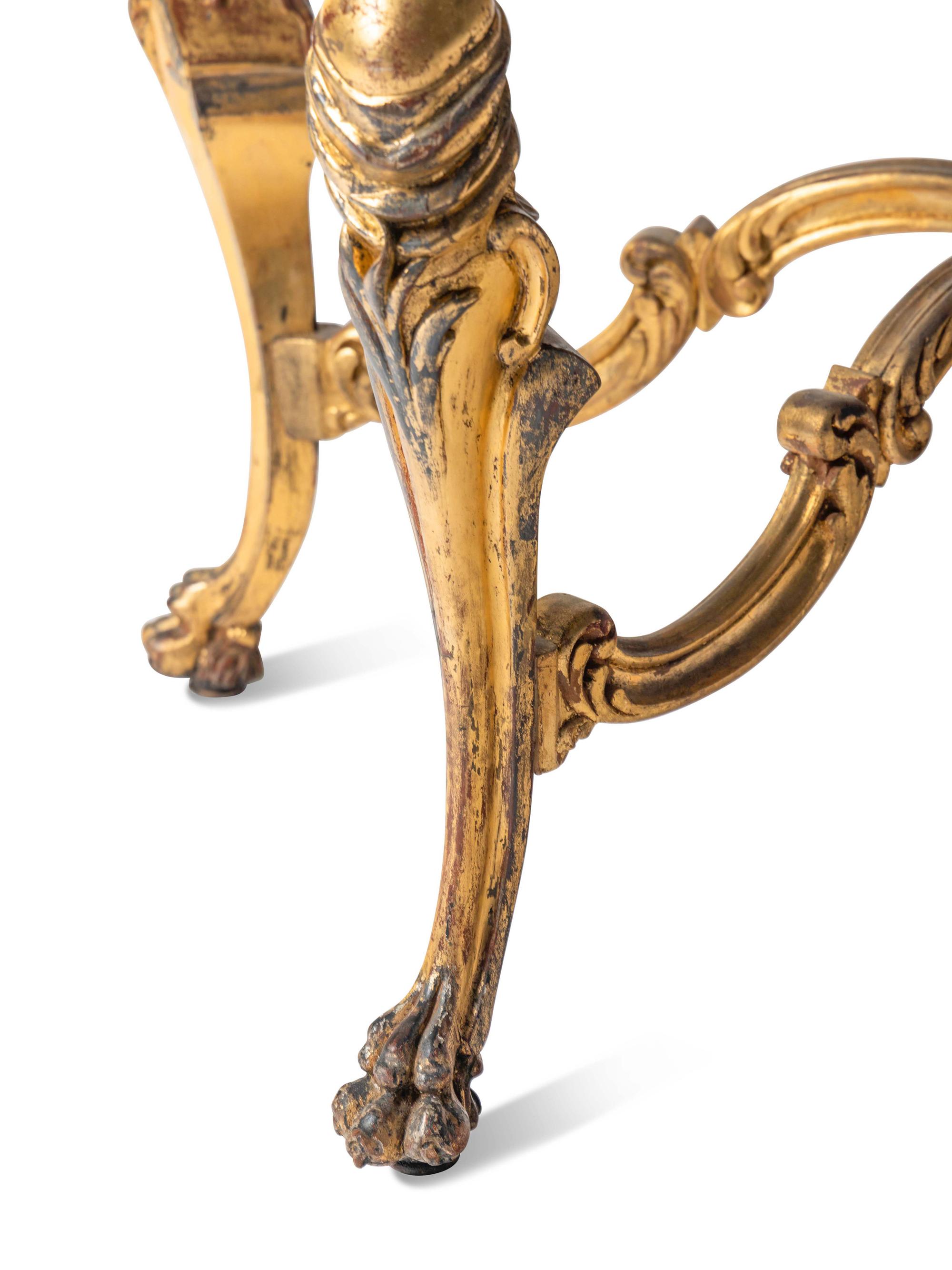 A Continental Rococo Style Giltwood Onyx-Top Table