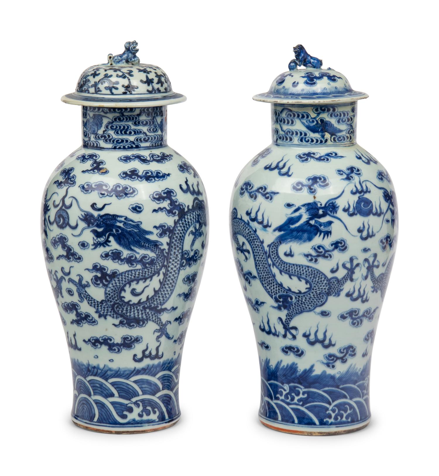 A Near Pair of Chinese Porcelain Covered Vases