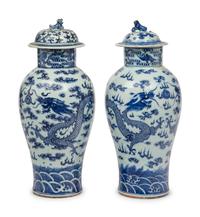 A Near Pair of Chinese Porcelain Covered Vases