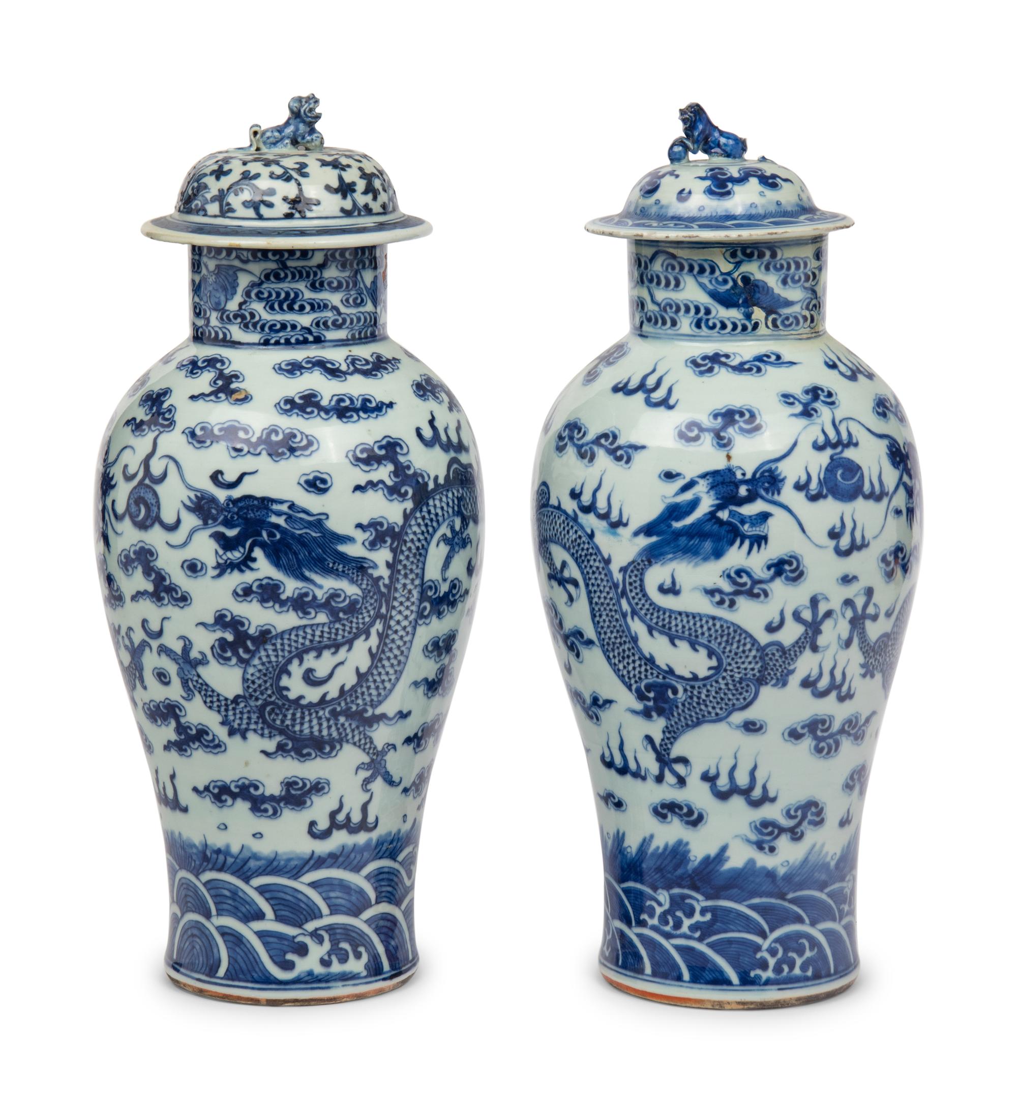 A Near Pair of Chinese Porcelain Covered Vases