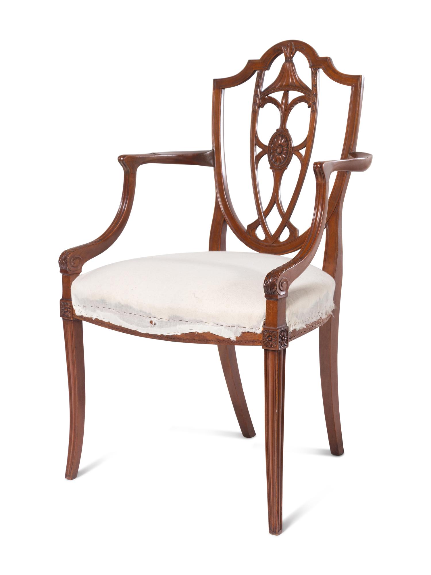 A Set of Four Federal Carved Cherrywood Shield-Back Dining Chairs