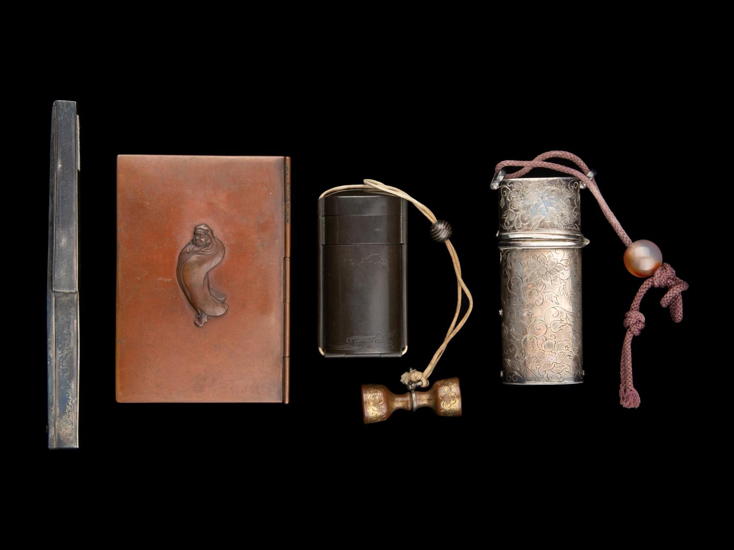 A Rare Japanese Silver Portable Tool Kit and Three Writing Sets