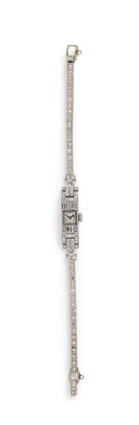A Platinum, 14 Karat White Gold and Diamond Bracelet,