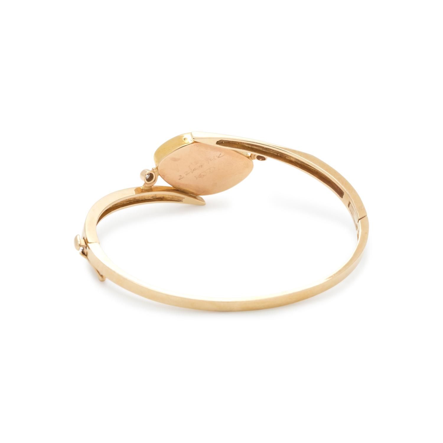 YELLOW GOLD AND OPAL BANGLE BRACELET