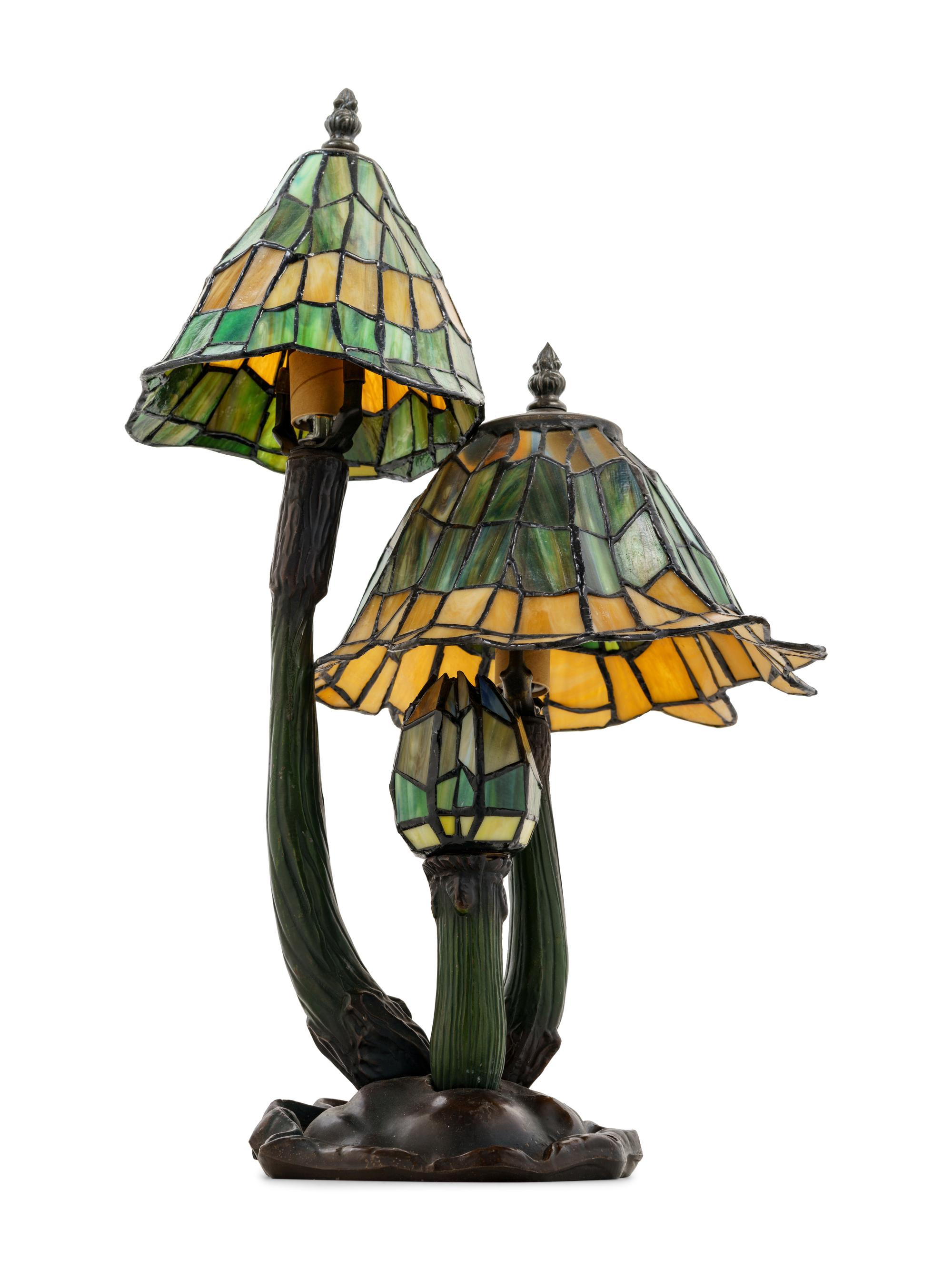 An Art Nouveau Style Cast and Patinated Bronze Leaded Glass Mushroom Desk Lamp
