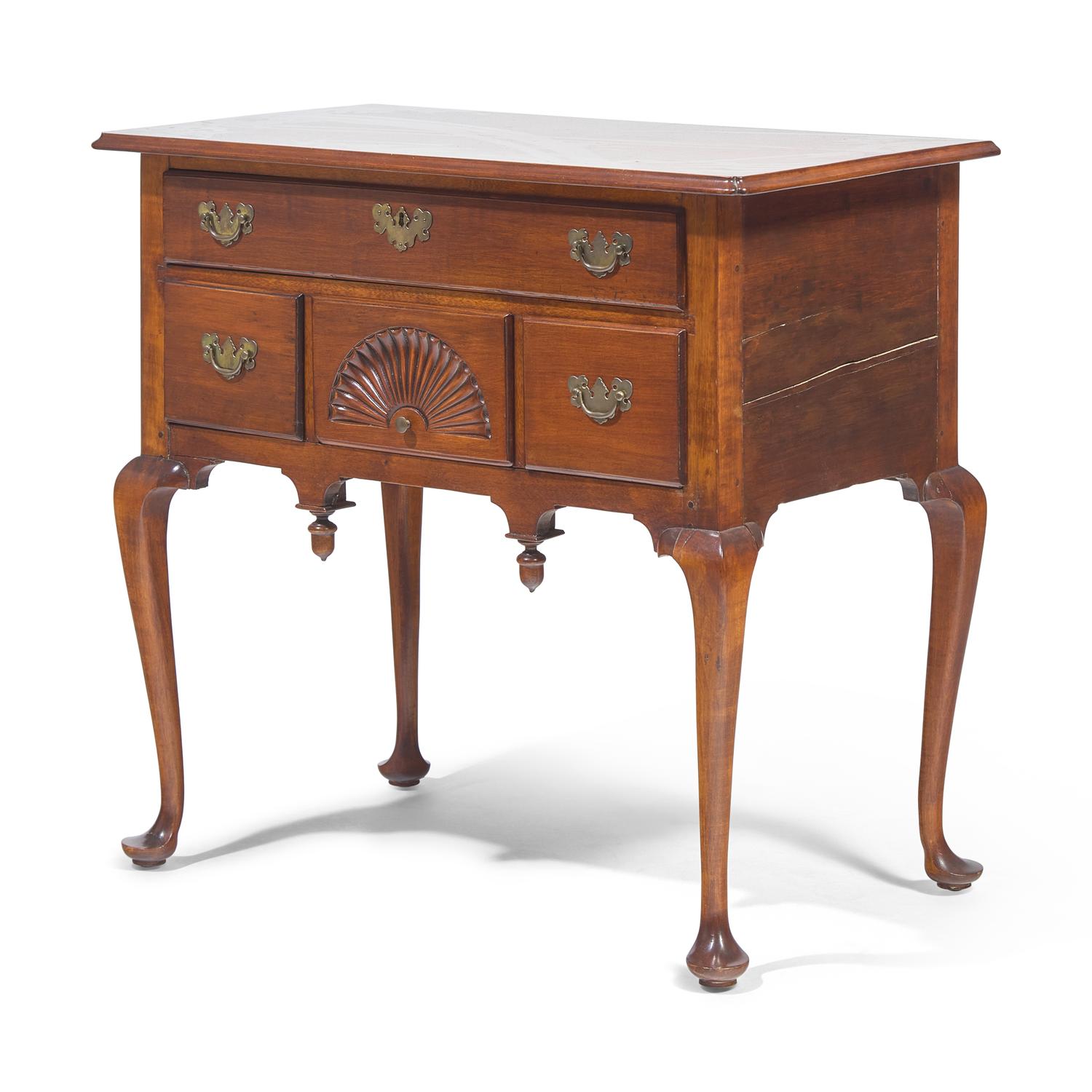 A Queen Anne Fan-Carved Cherrywood Pad-Foot Dressing Table