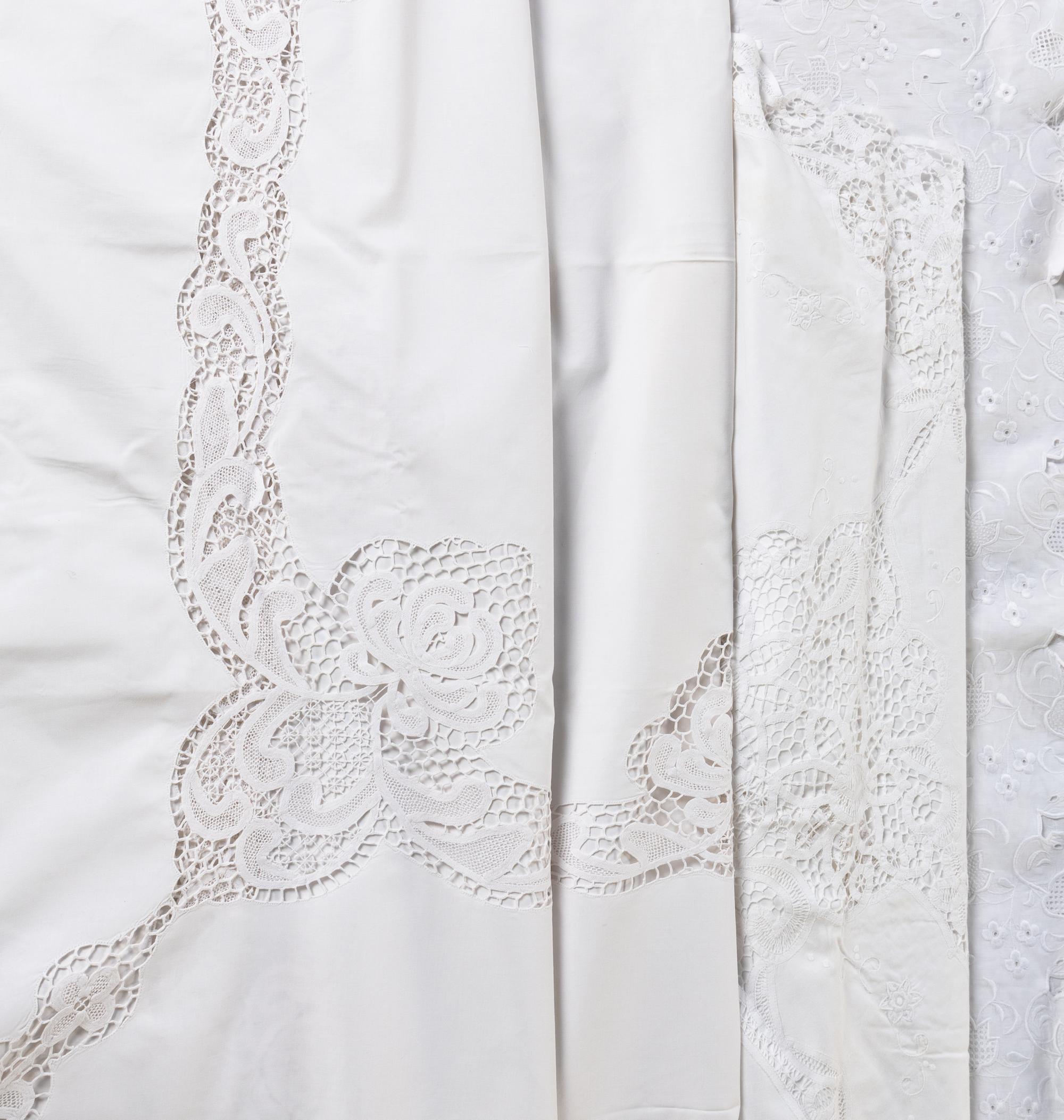 A Group of White Lace Linens
