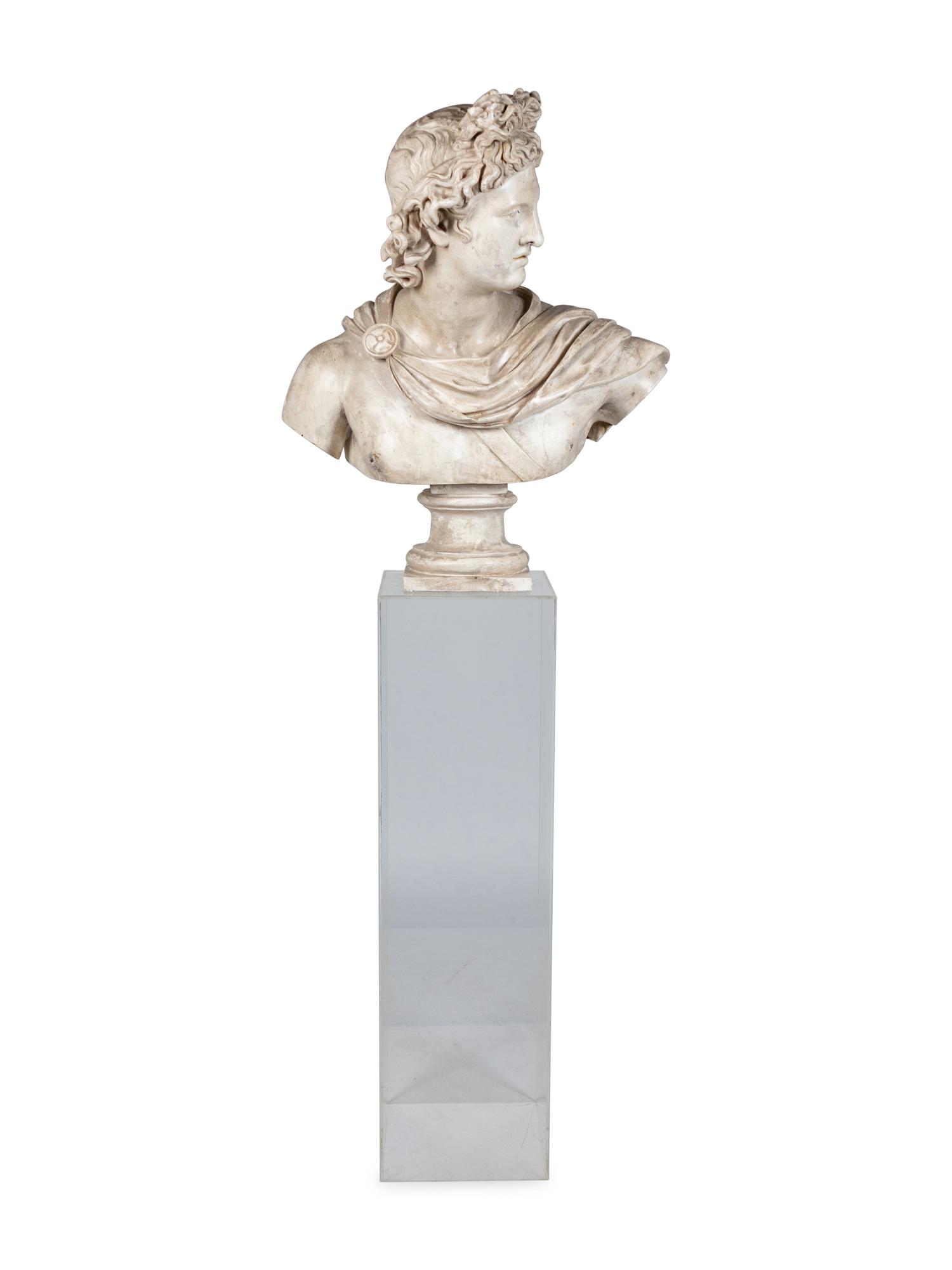 A Terracotta Bust of the Apollo Belvedere and an Acrylic Pedestal