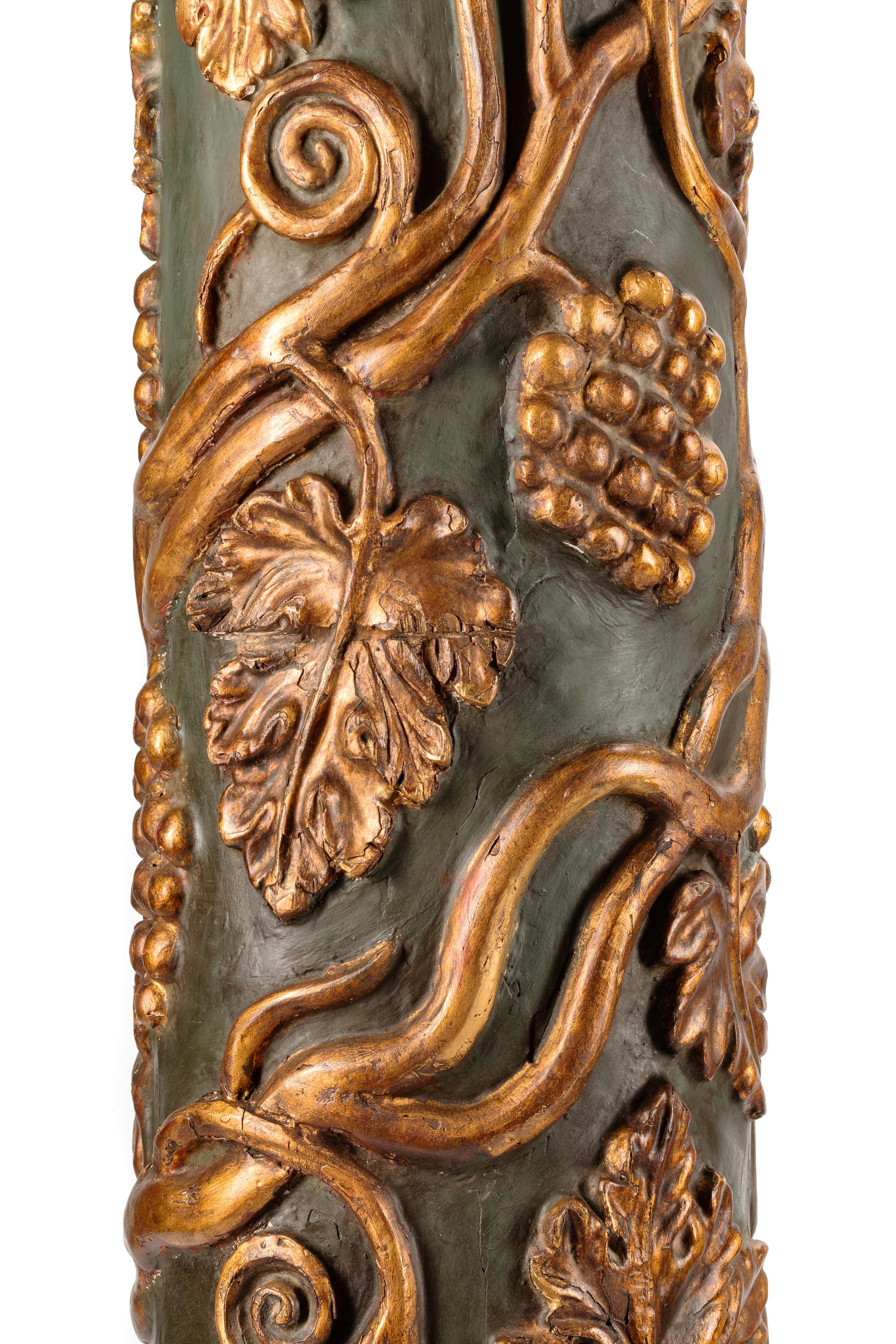 A Pair of Continental Painted and Parcel Gilt Columns