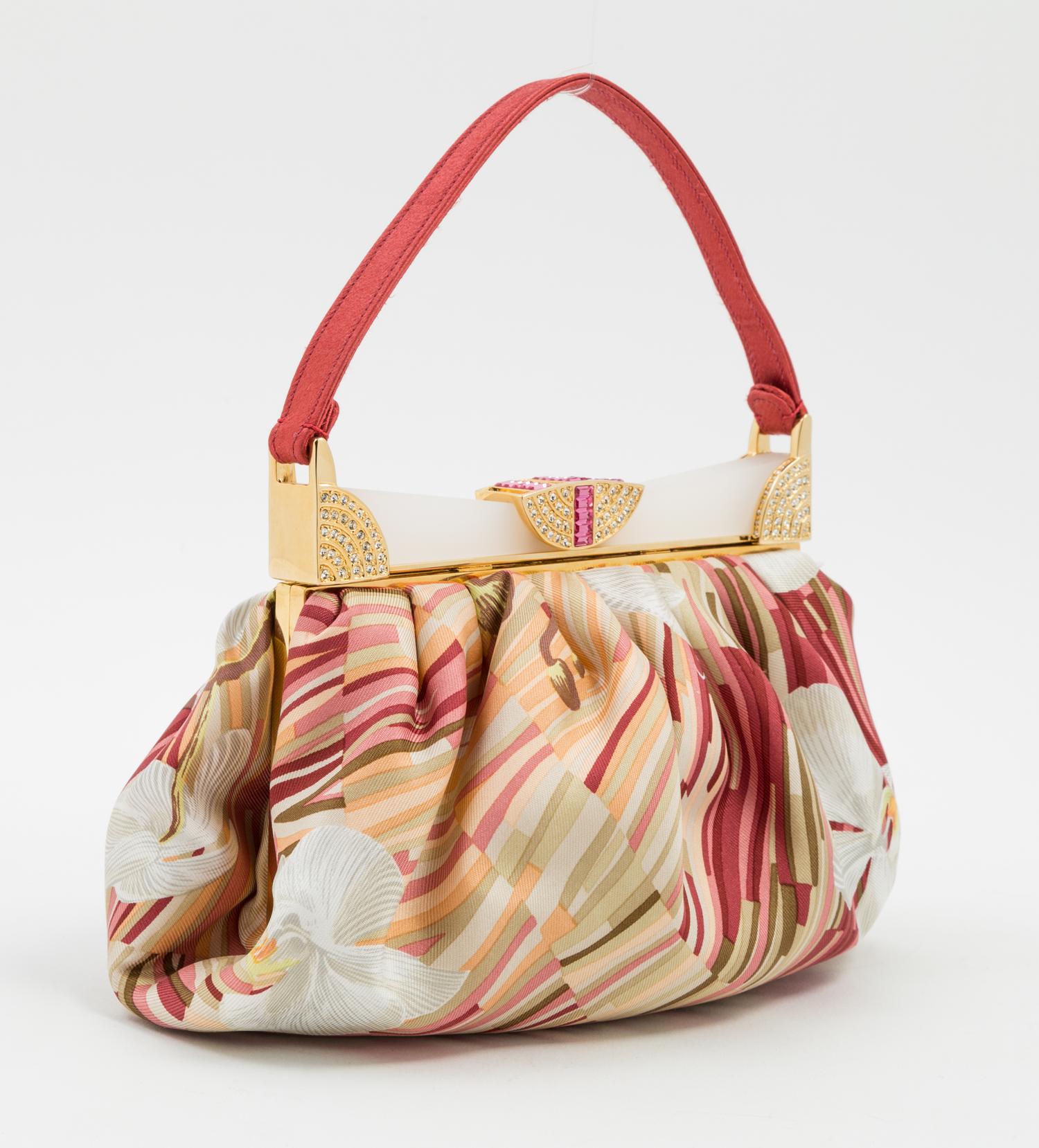 A Judith Leiber Silk Floral Handbag, 7" x 5.5" x 1.5".