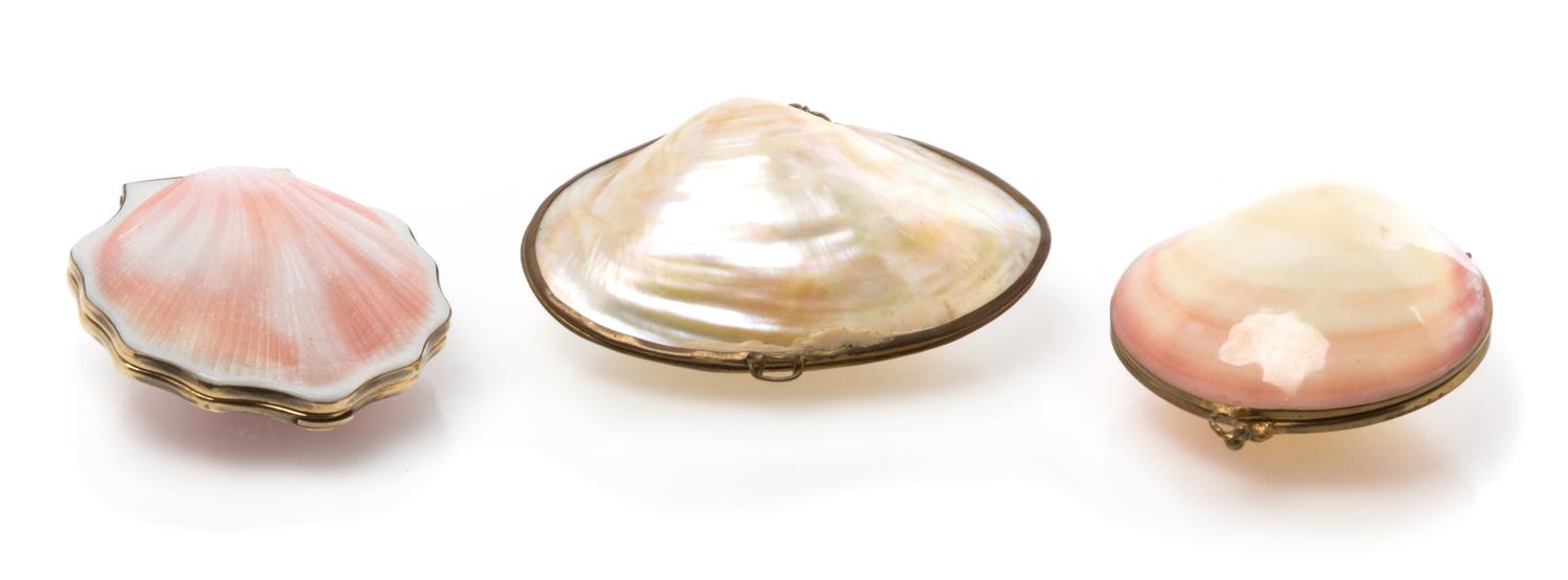 A Soviet Russian Faux Seashell Mounted Silver-Gilt Compact, Mid-20th century, the hinged seashell case having a silver-gilt border and