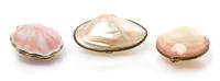 A Soviet Russian Faux Seashell Mounted Silver-Gilt Compact, Mid-20th century, the hinged seashell case having a silver-gilt border and