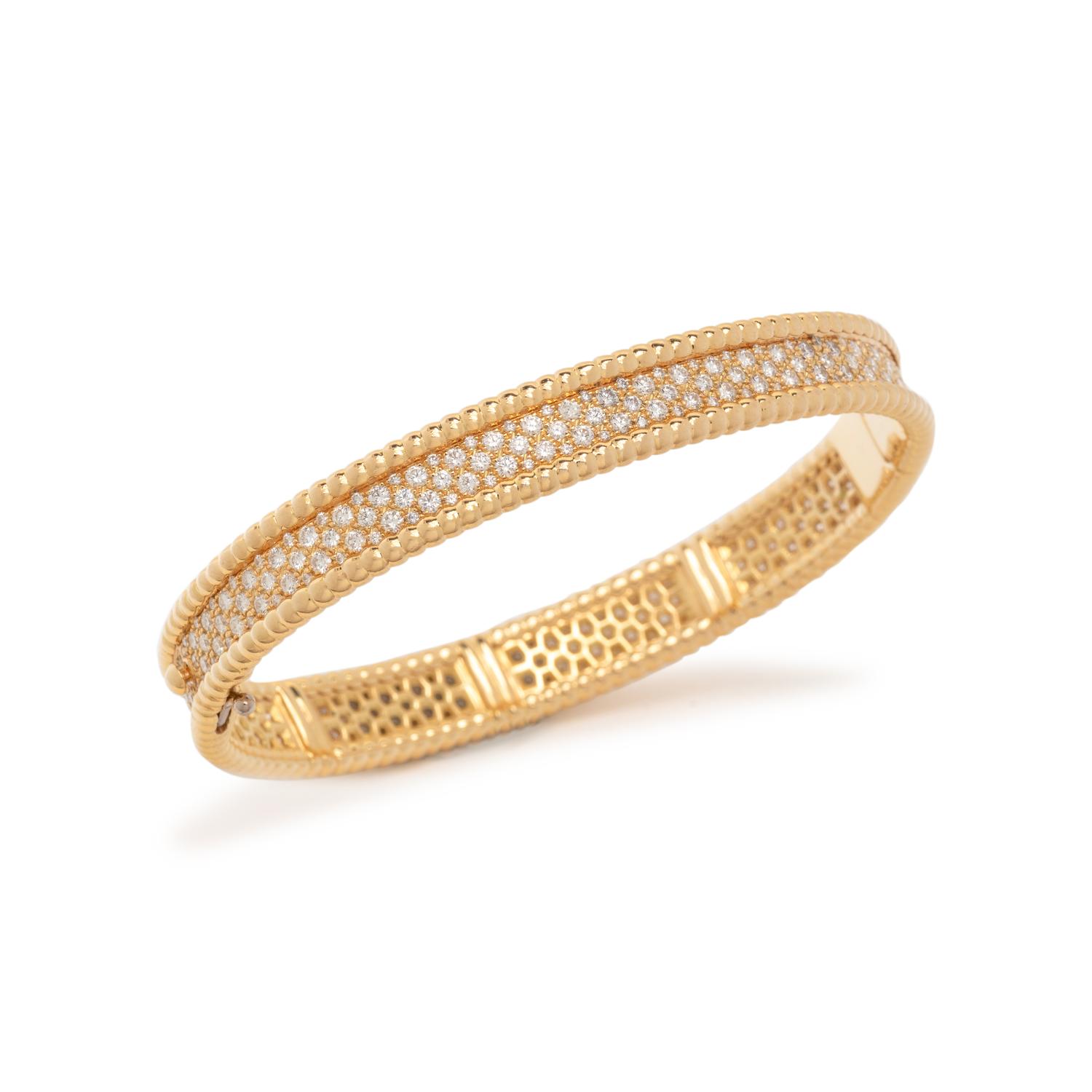 VAN CLEEF & APRELS, YELLOW GOLD AND DIAMOND 'PERLÉE' BANGLE BRACELET