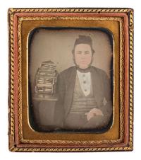 [EARLY PHOTOGRAPHY]. Sixth plate daguerreotype featuring a doctor/dentist posed with his bag of instruments.