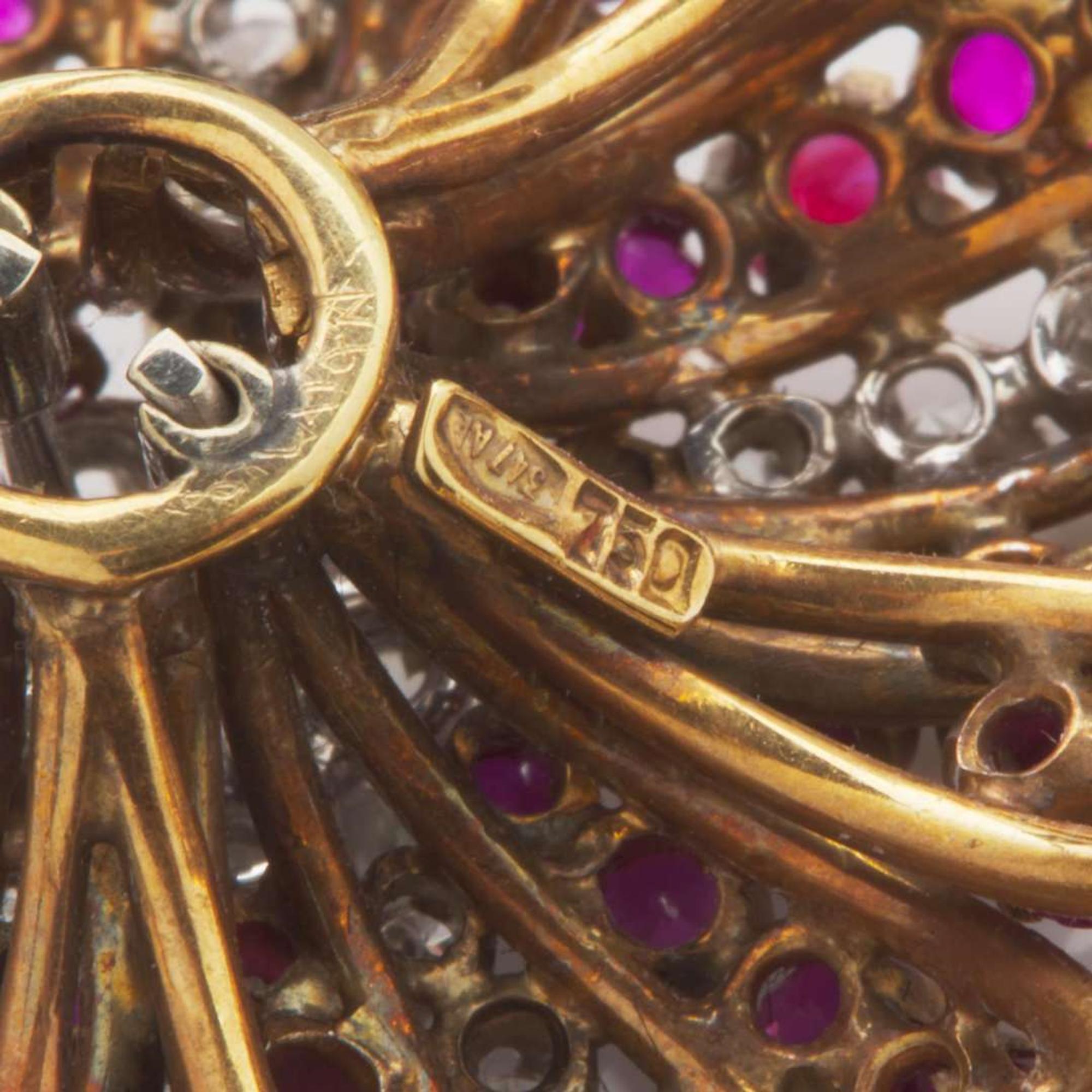 An 18K Yellow Gold, Diamond, and Ruby Brooch