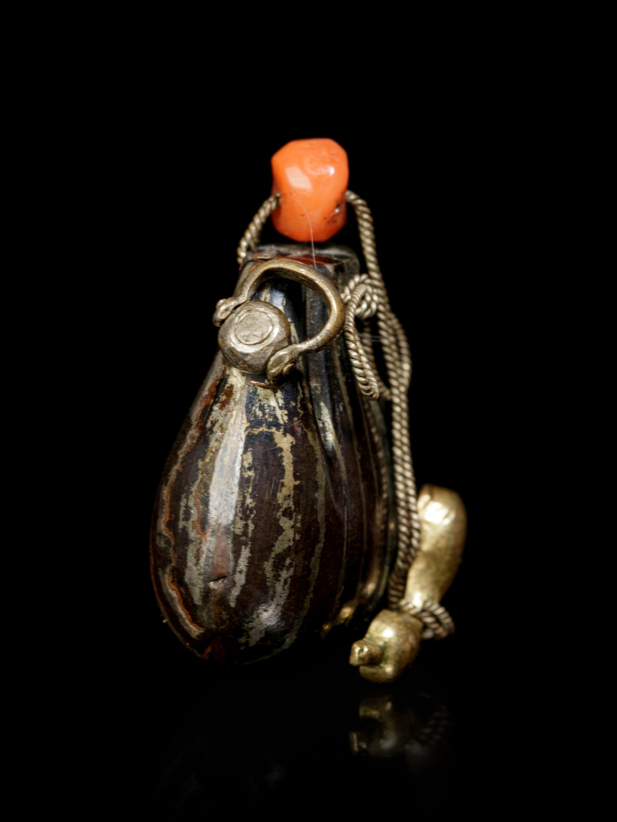 A Silver, Copper and Shakudo Kinchaku Pouch-Form Ojime