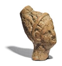 A Greek Terracotta Female Head
