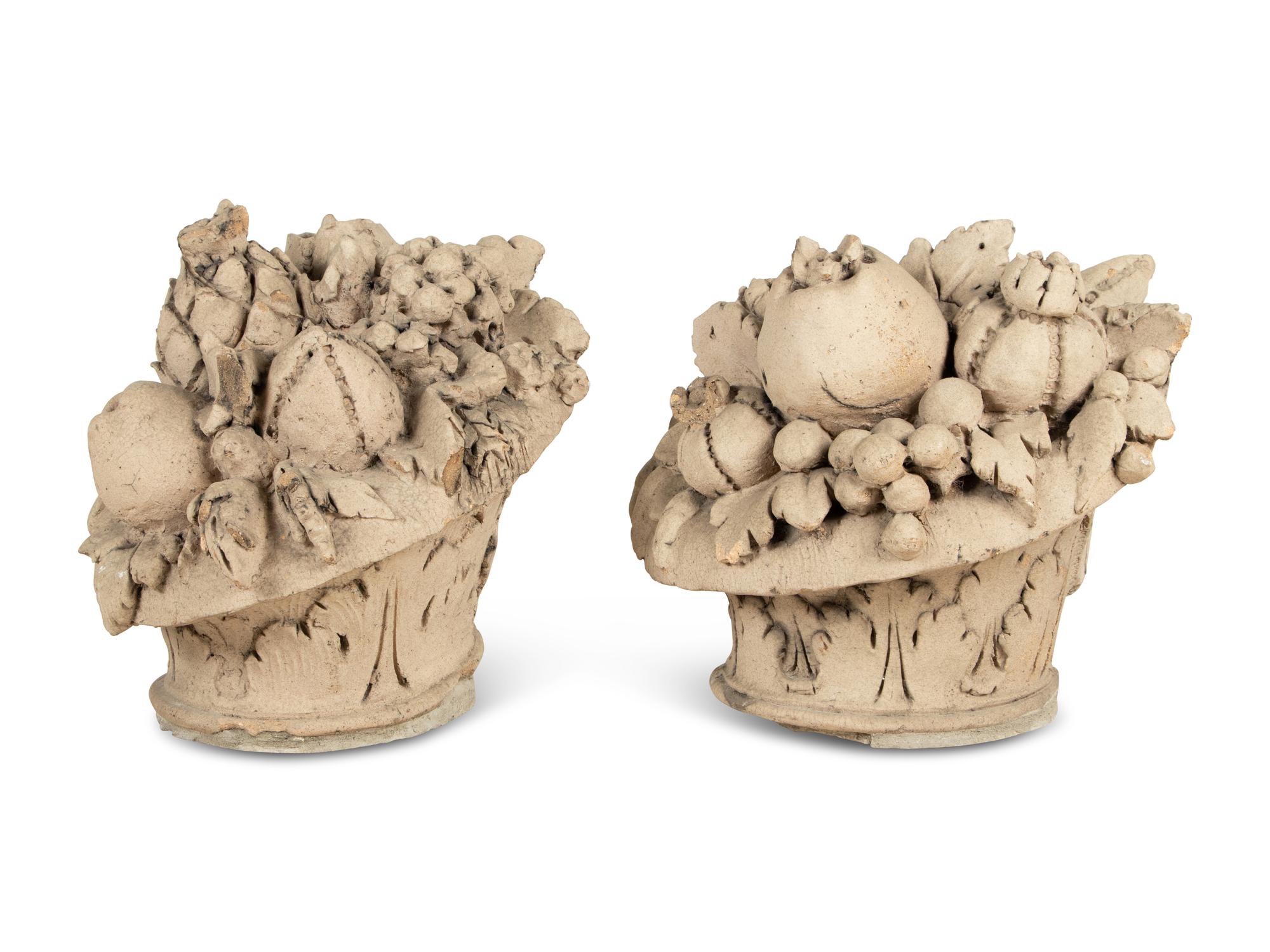 A Pair of Cast Stone Models of Fruit Baskets