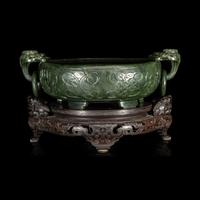 A Chinese Carved Spinach Jade Marriage Bowl, Late Qing/Republic Period 晚清/民國 碧玉雙魚活環洗