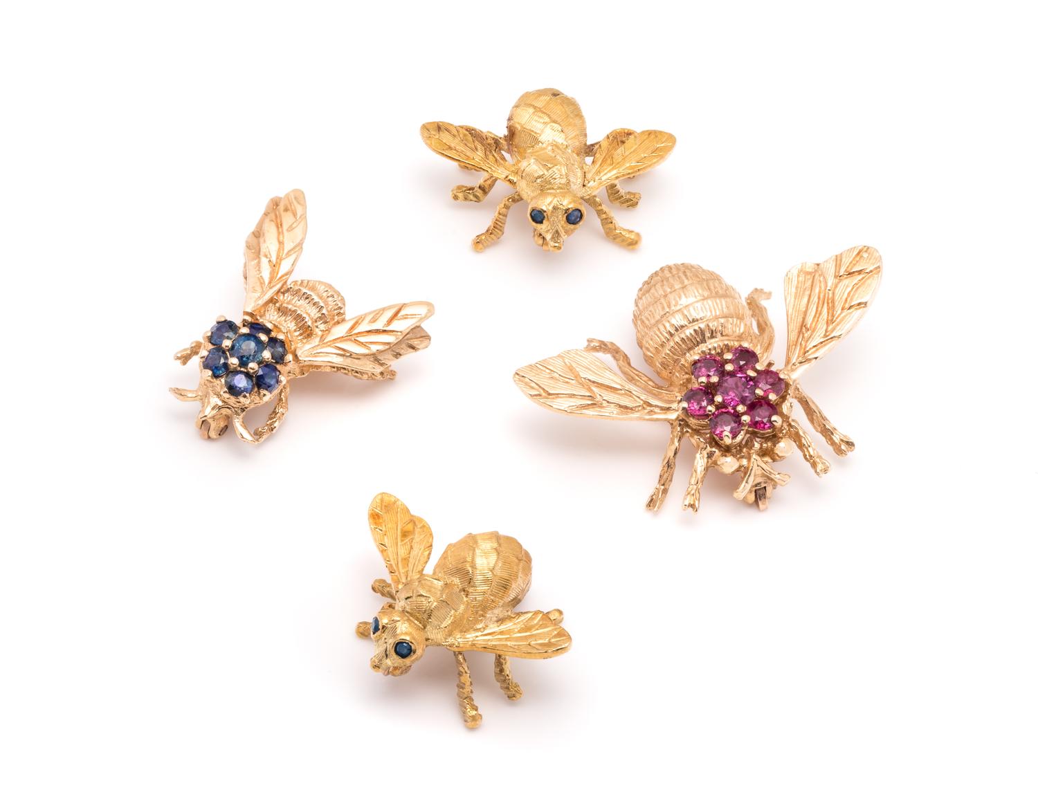 COLLECTION OF YELLOW GOLD BEE BROOCHES