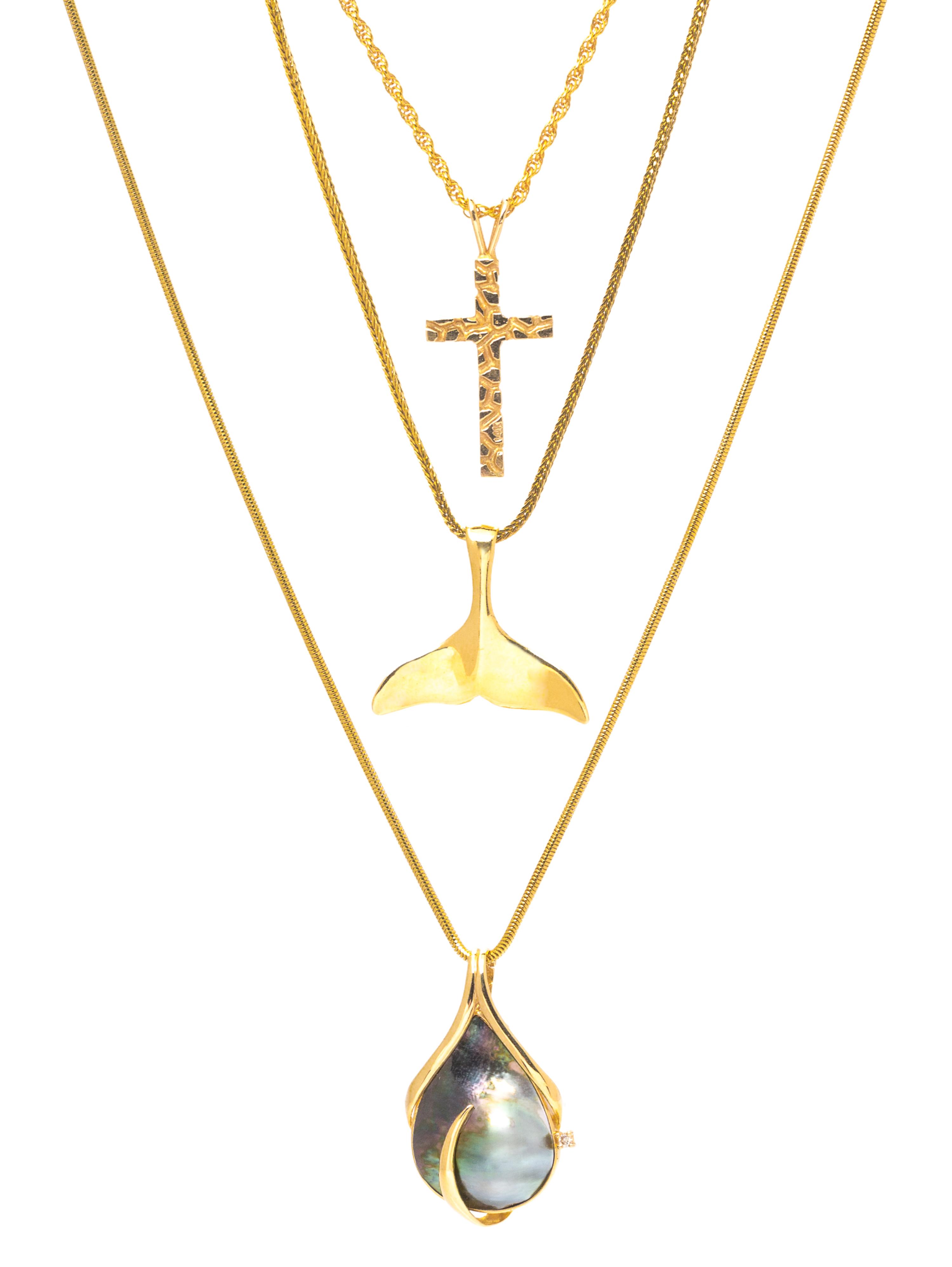 A Collection of 14 Karat Yellow Gold Pendant Necklaces, 24.40 dwts.