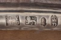 A Pair of George IV Silver Wine Bottle Coasters