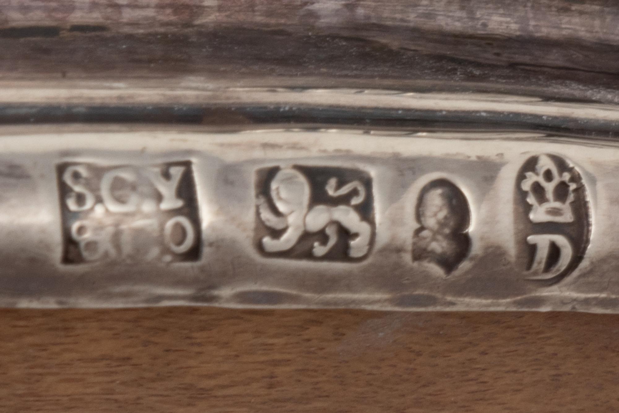 A Pair of George IV Silver Wine Bottle Coasters