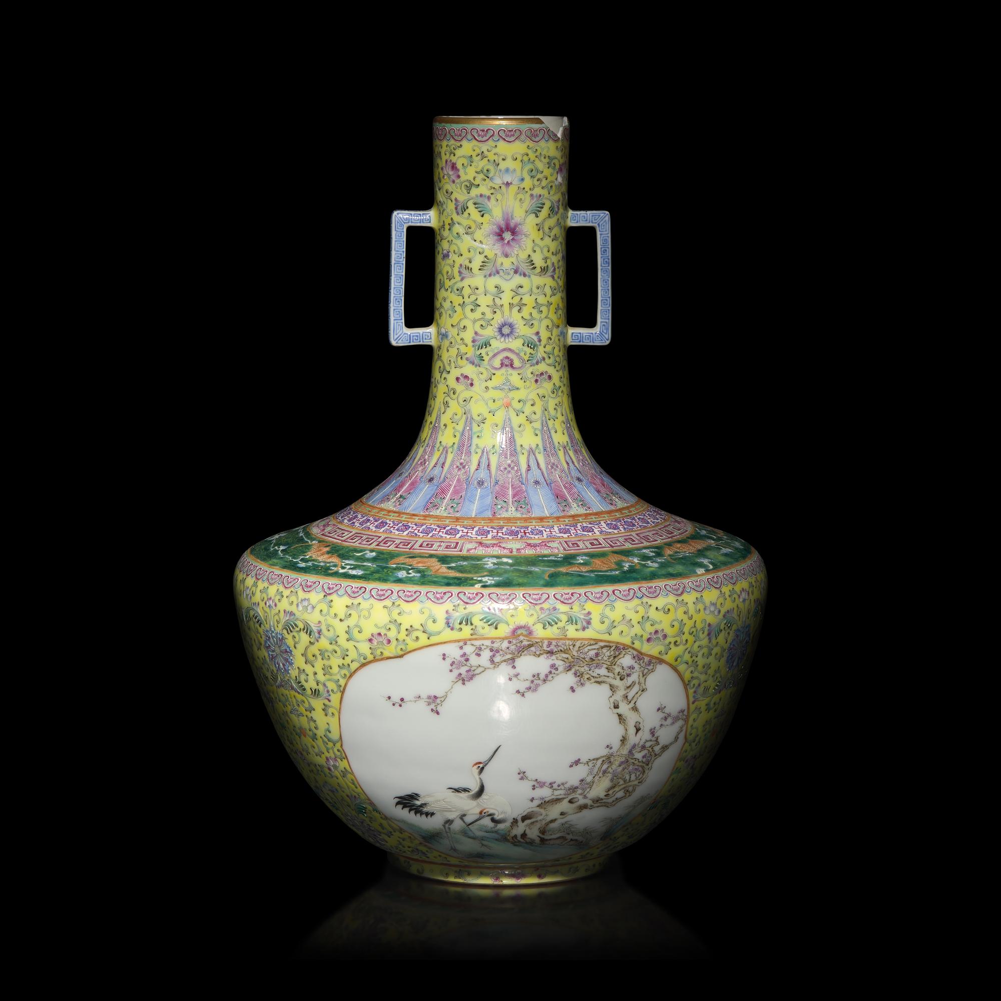 A Chinese Yellow Ground Famille Rose Porcelain 'Floral' Vase, Dated 1947 — 1947年作 ’蔣瓷‘黃地粉彩開光花鳥圖雙耳瓶