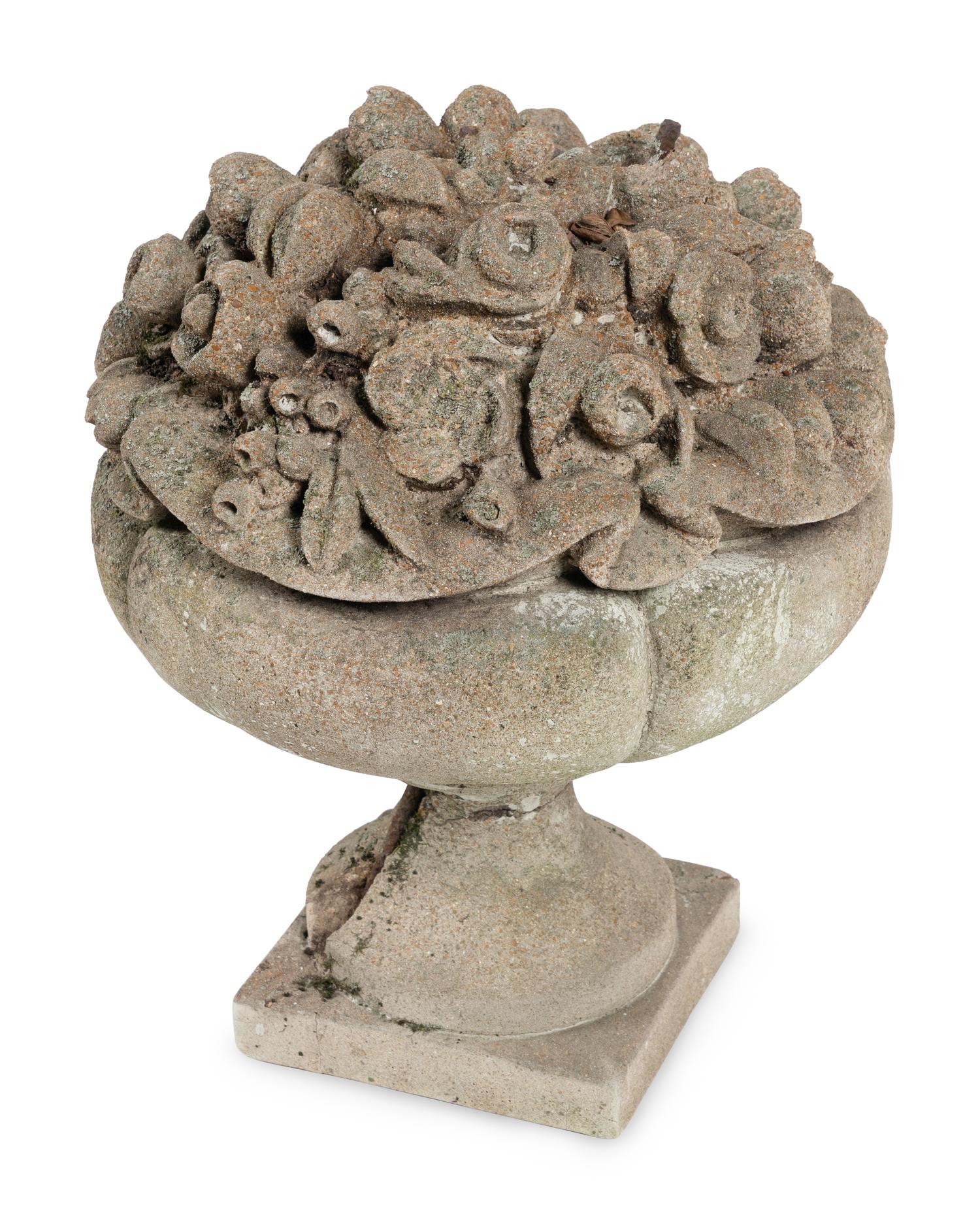 A Pair of Cast Stone Garden Ornaments