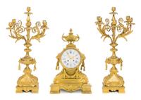 A Napoleon III Gilt Bronze Clock Garniture Height of clock 25 1/2 inches. — LEMERLE-CHARPENTIER & CIE, PARIS, 19TH CENTURY