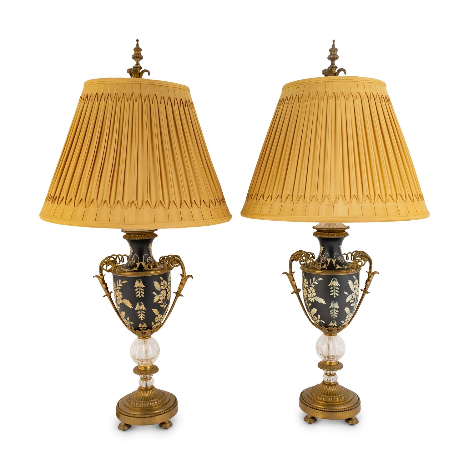 A Pair of Tole and Glass Lamps