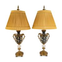 A Pair of Tole and Glass Lamps