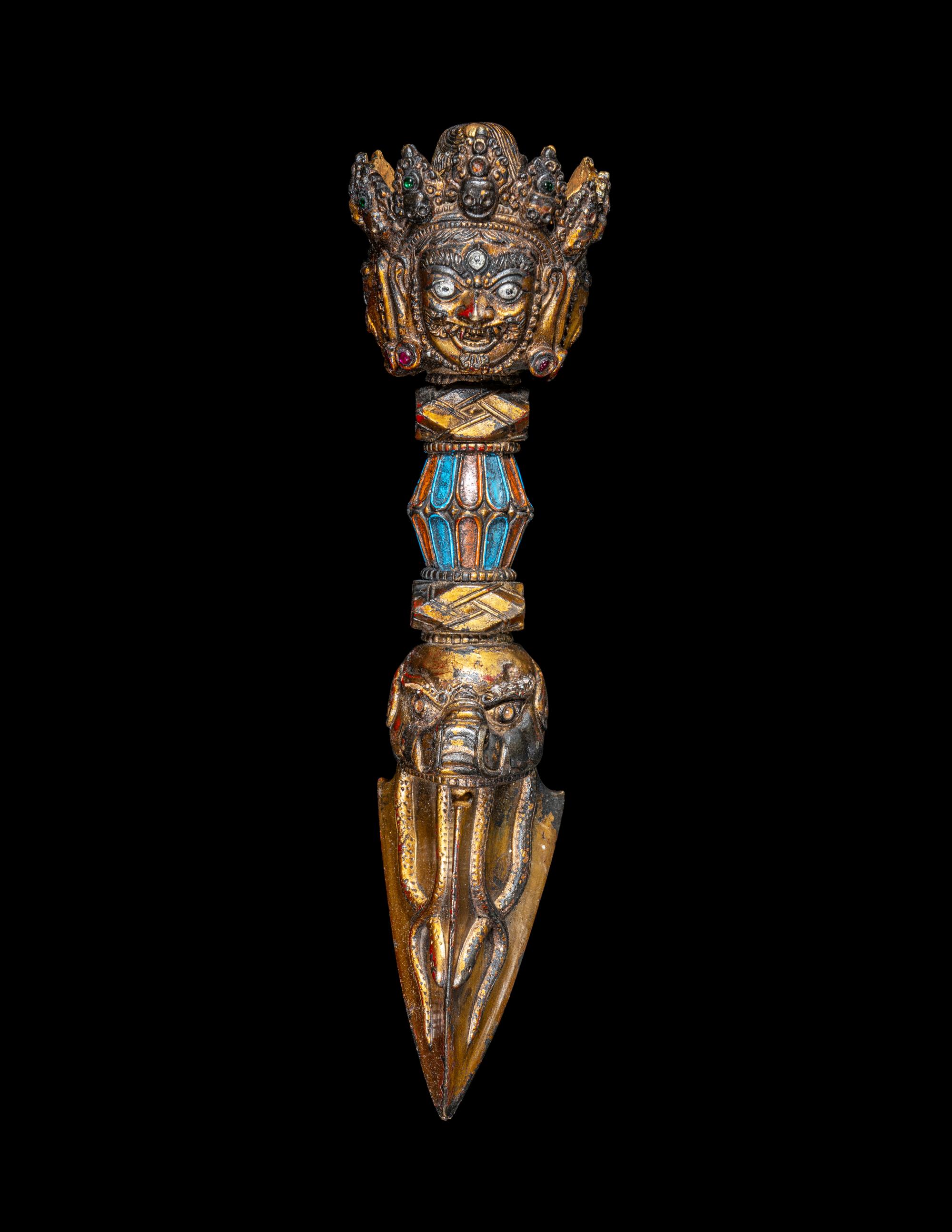 A Tibetan Gilt and Painted Bronze Vajra