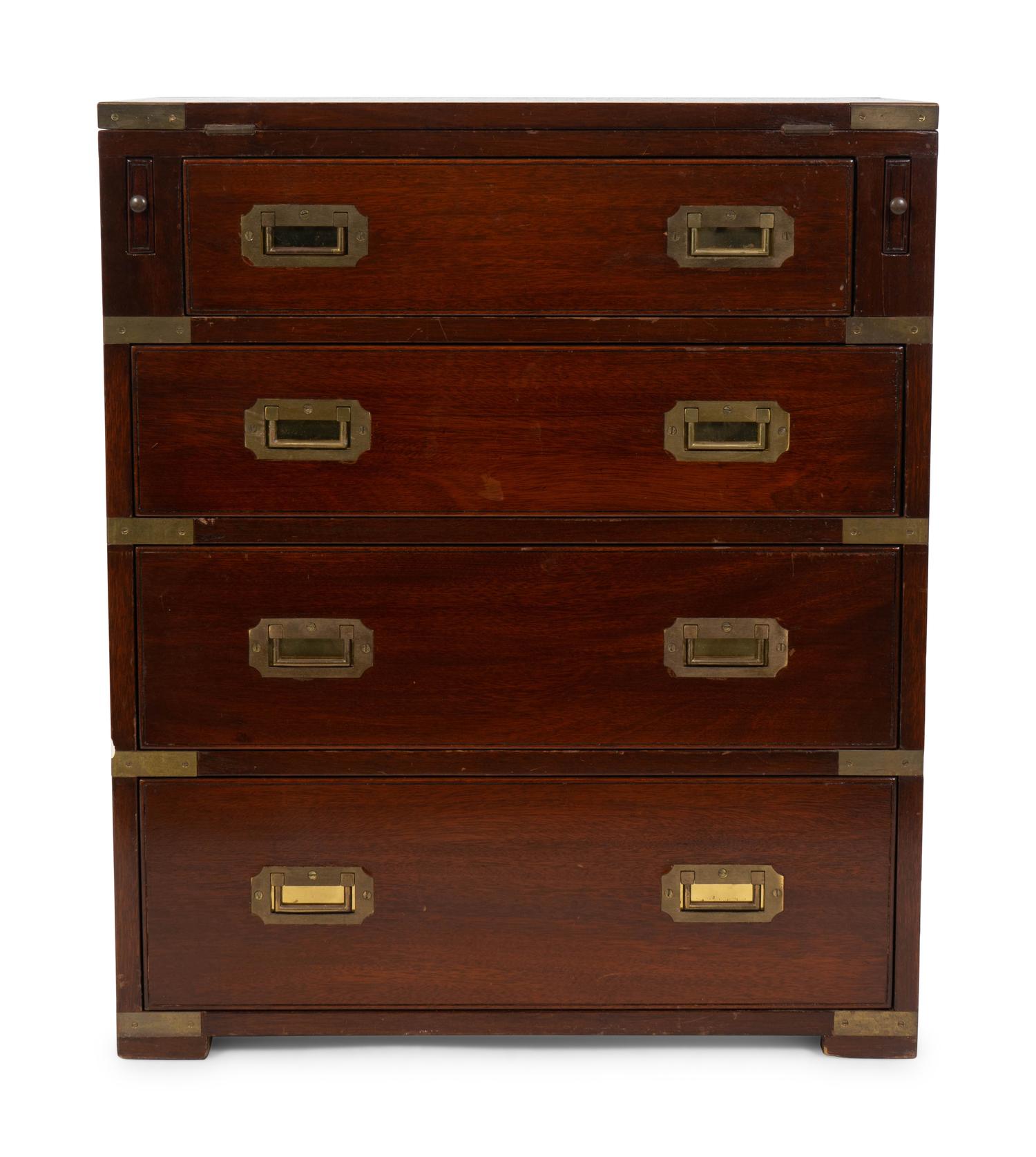 A Diminutive English Campaign Style Brass Mounted Mahogany Chest of Drawers — 20TH CENTURY