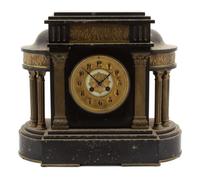 A French Black Marble and Gilt Metal Mounted Mantle Clock Height 14 1/2 x width 17 inches. — 19TH CENTURY