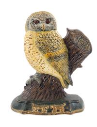 A Cast Iron Doorstop Height 12 1/2 inches.