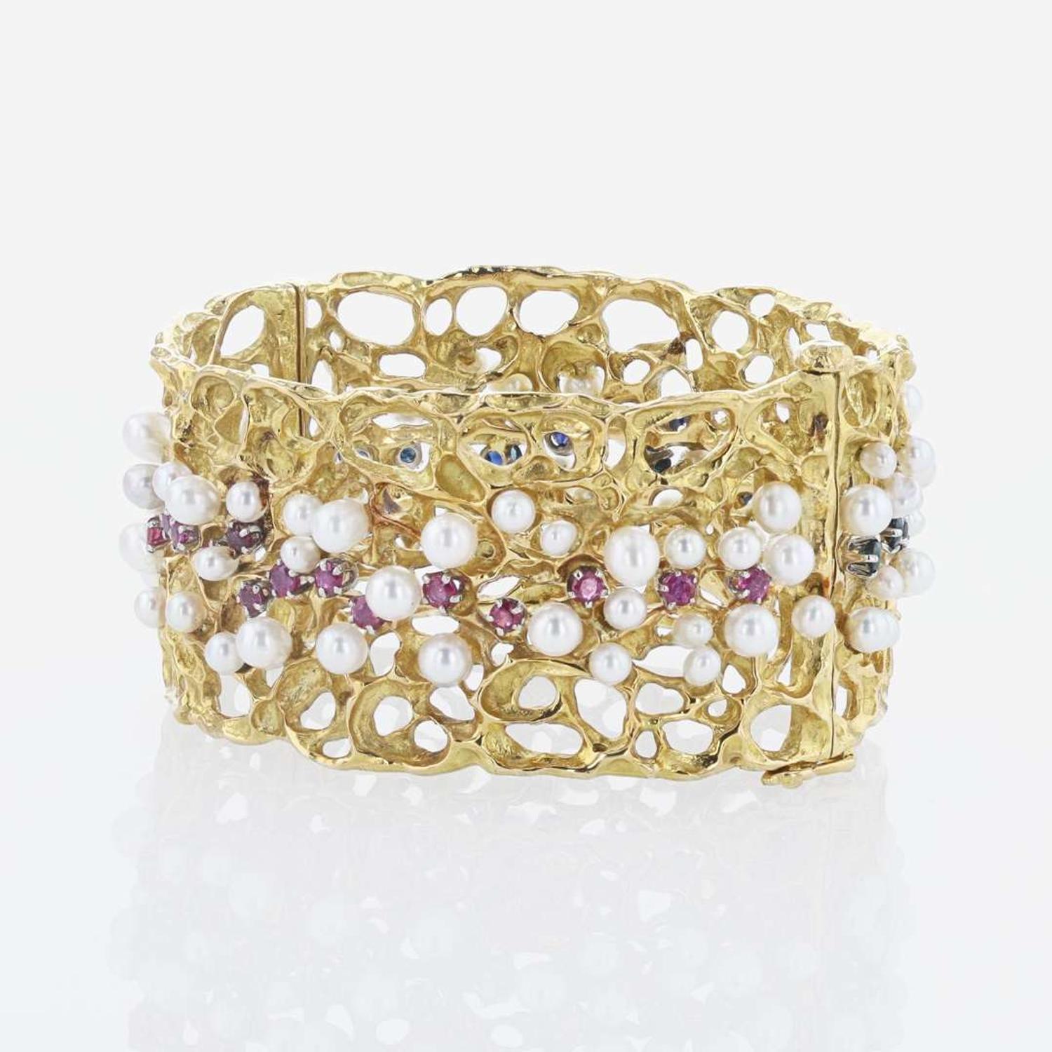 An 18K Yellow Gold and Gemstone Bangle by Karl Stittgen