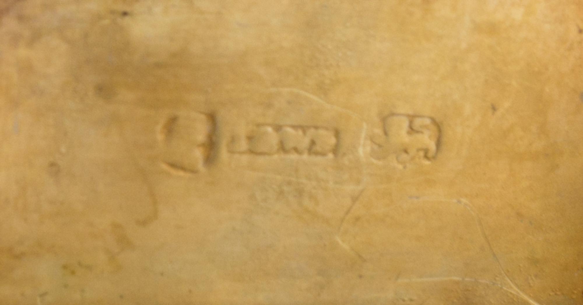 A George IV Silver Vinaigrette, Maker's mark T&WS, Birmingham, 1822, having a floral and foliate decorated border centered by a cartouc