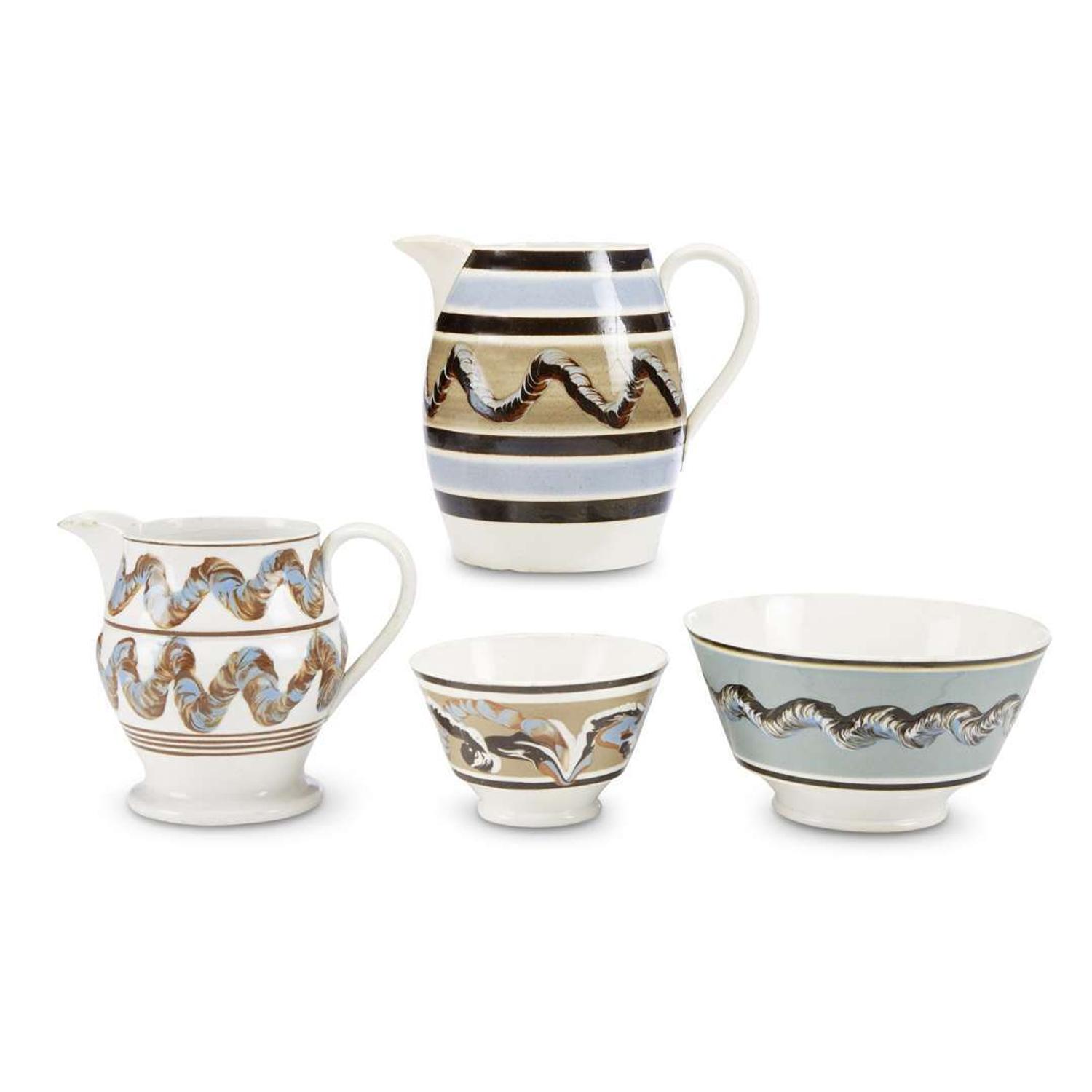 Group of four "Earthworm" decorated Mochaware items England, early 19th century