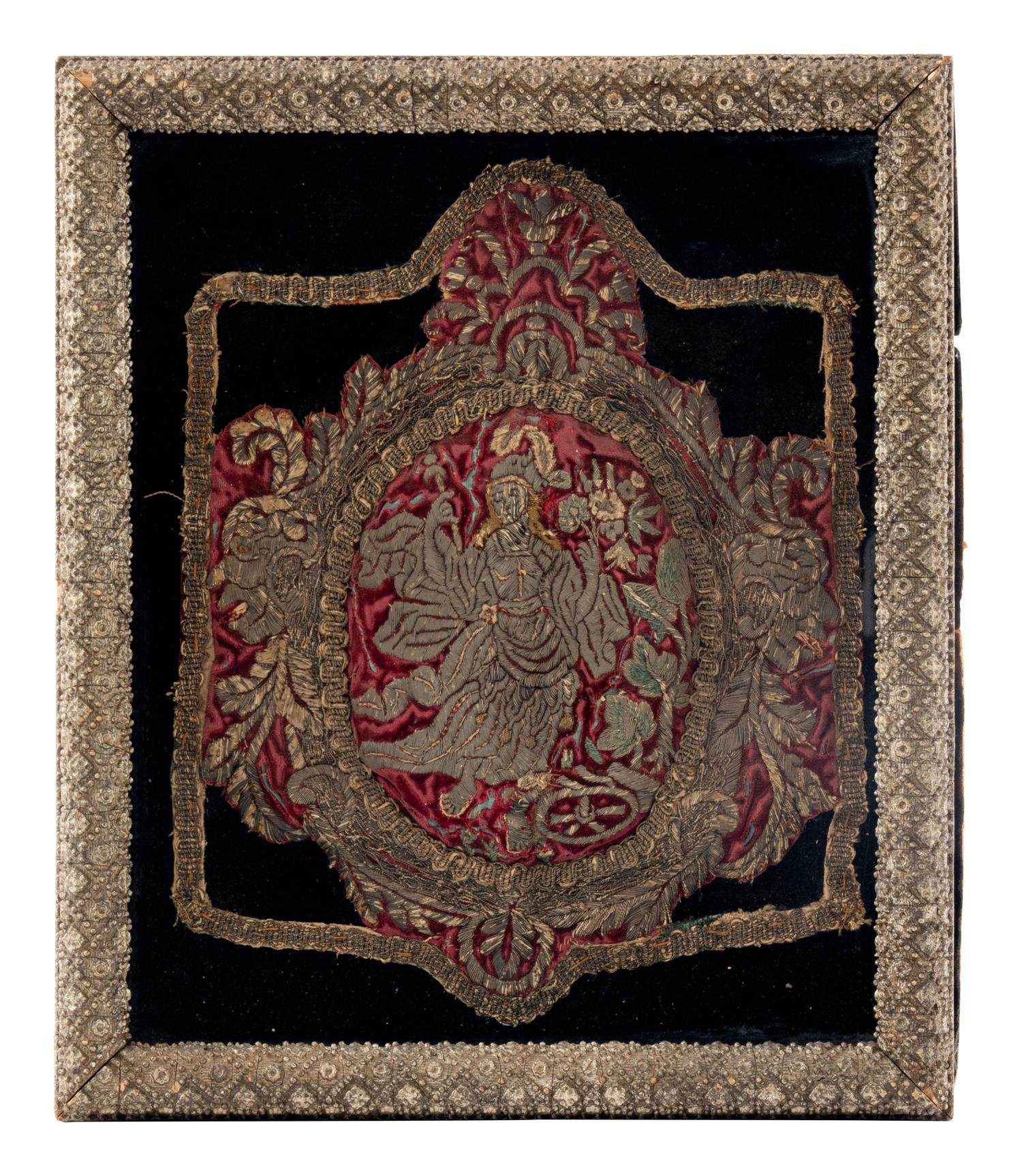 A Red Silk Velvet, Silk and Silver Filé Needlework Medallion