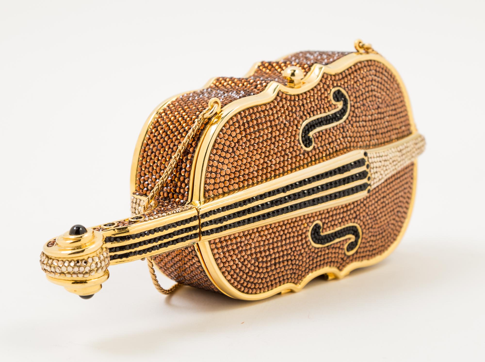 A Judith Leiber Crystal Cello Minaudiere, 3.5" x 7.5" x 1.5".